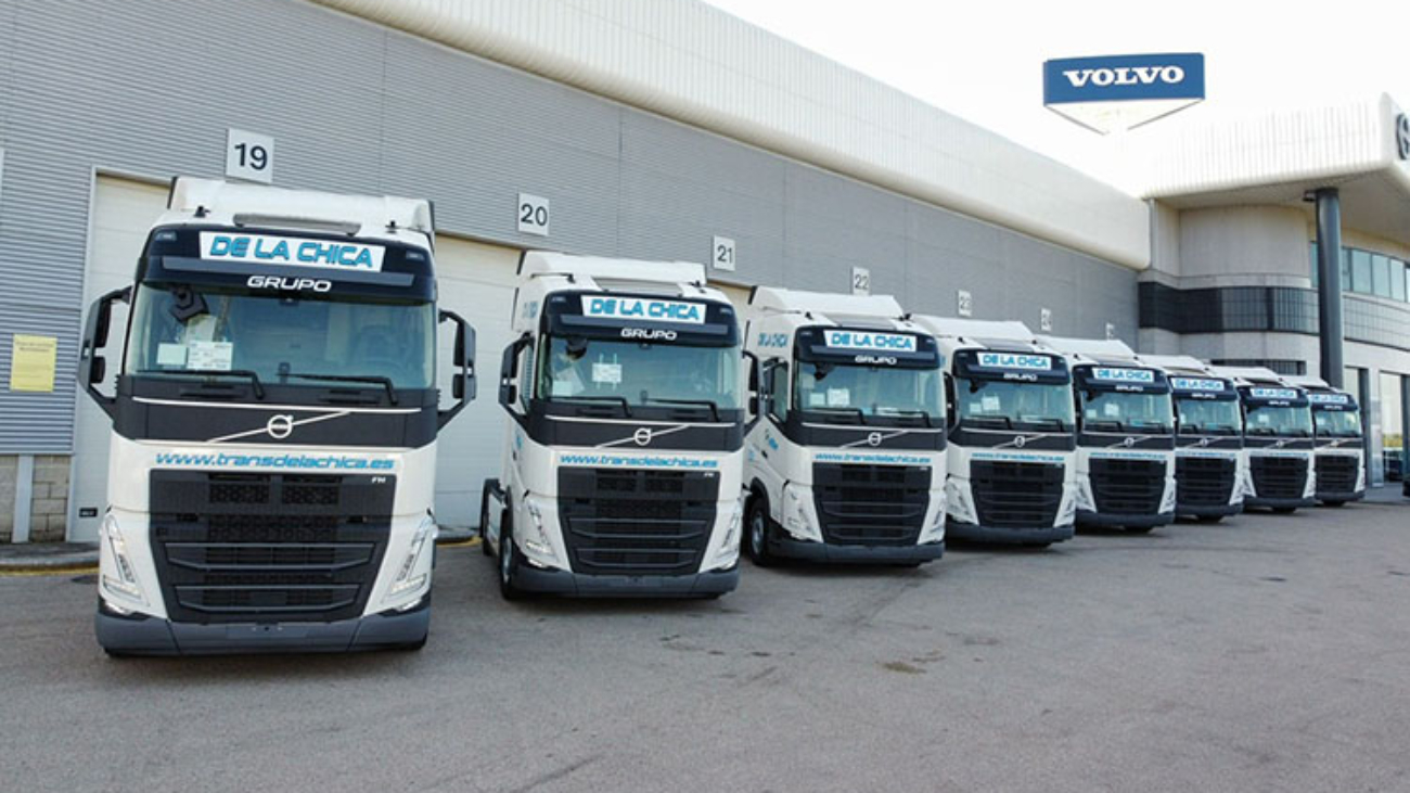 Plugged in chargers into two electric cars at charge station