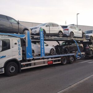 VOLVO FM 337 CARGADO 9 COCHES Y MOTO